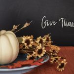 pumpkin and flowers with words "Give Thanks"